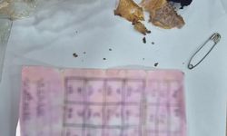 Yapı marketin raflarının arasında muska çıktı: 'Büyücülerin şerrinden Allah'a sığınırım'